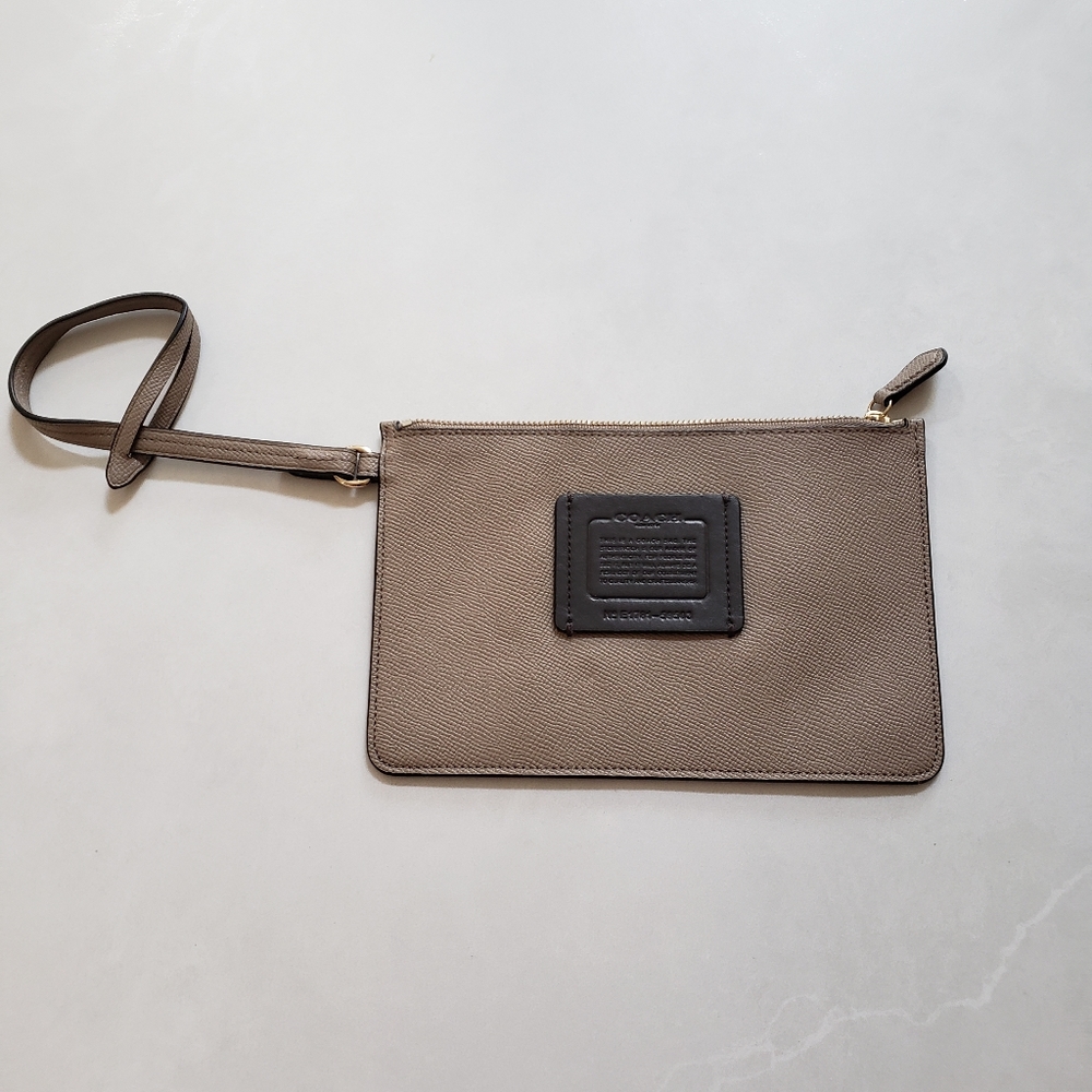 Large neutral beige coach wristlet
